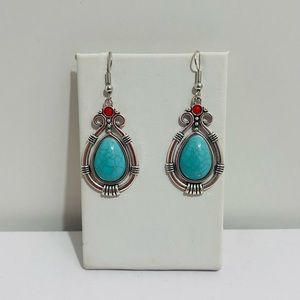 Turquoise color silver earrings made by EvileyebyMaria